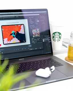 turned on MacBook Pro displaying music