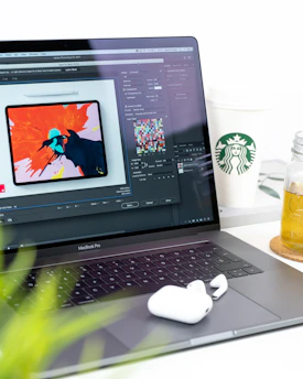 turned on MacBook Pro displaying music
