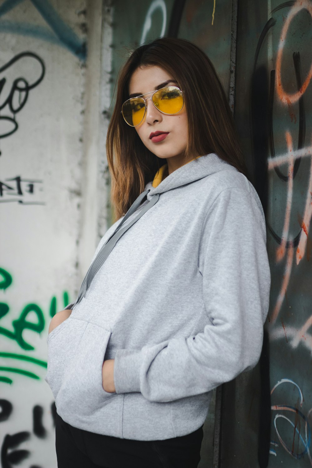 woman leaning on wall