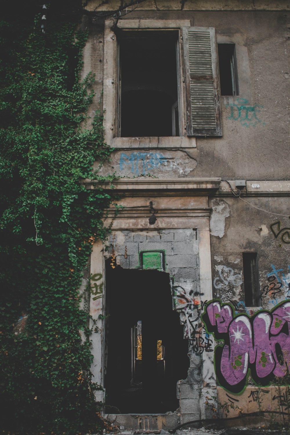 purple graffiti on wall