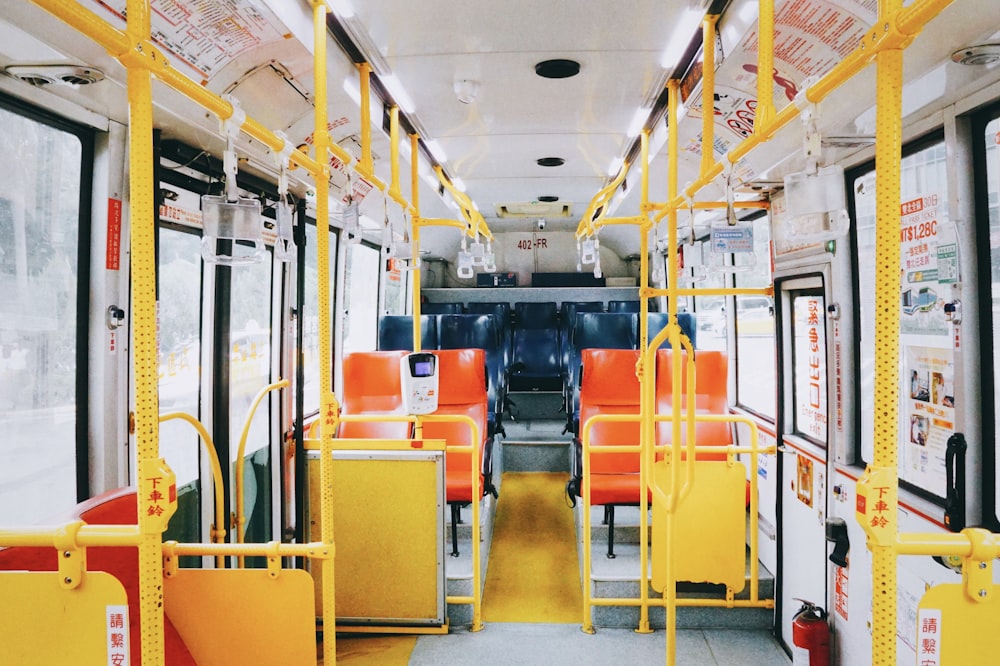 empty white and yellow bus