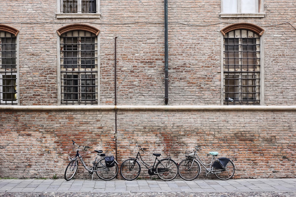 three parked bicycles