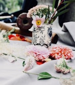 An elegant decorative vase filled with fresh blooms.