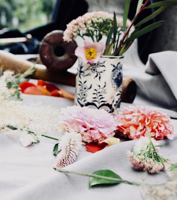 An elegant decorative vase filled with fresh blooms.