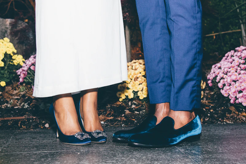elegant pair standing side by side