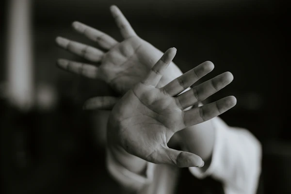 Open hands, palms turned upward
