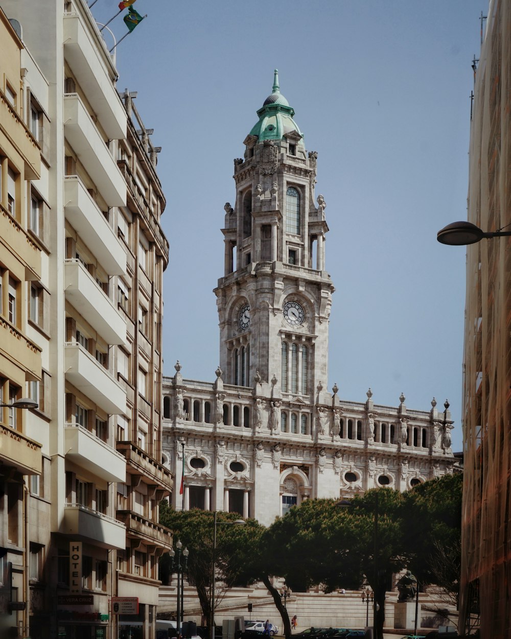 white concrete clock tower