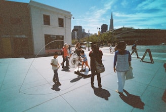 people with children at park during daytime