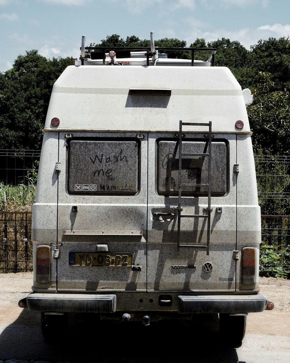 selective focus photography of white van