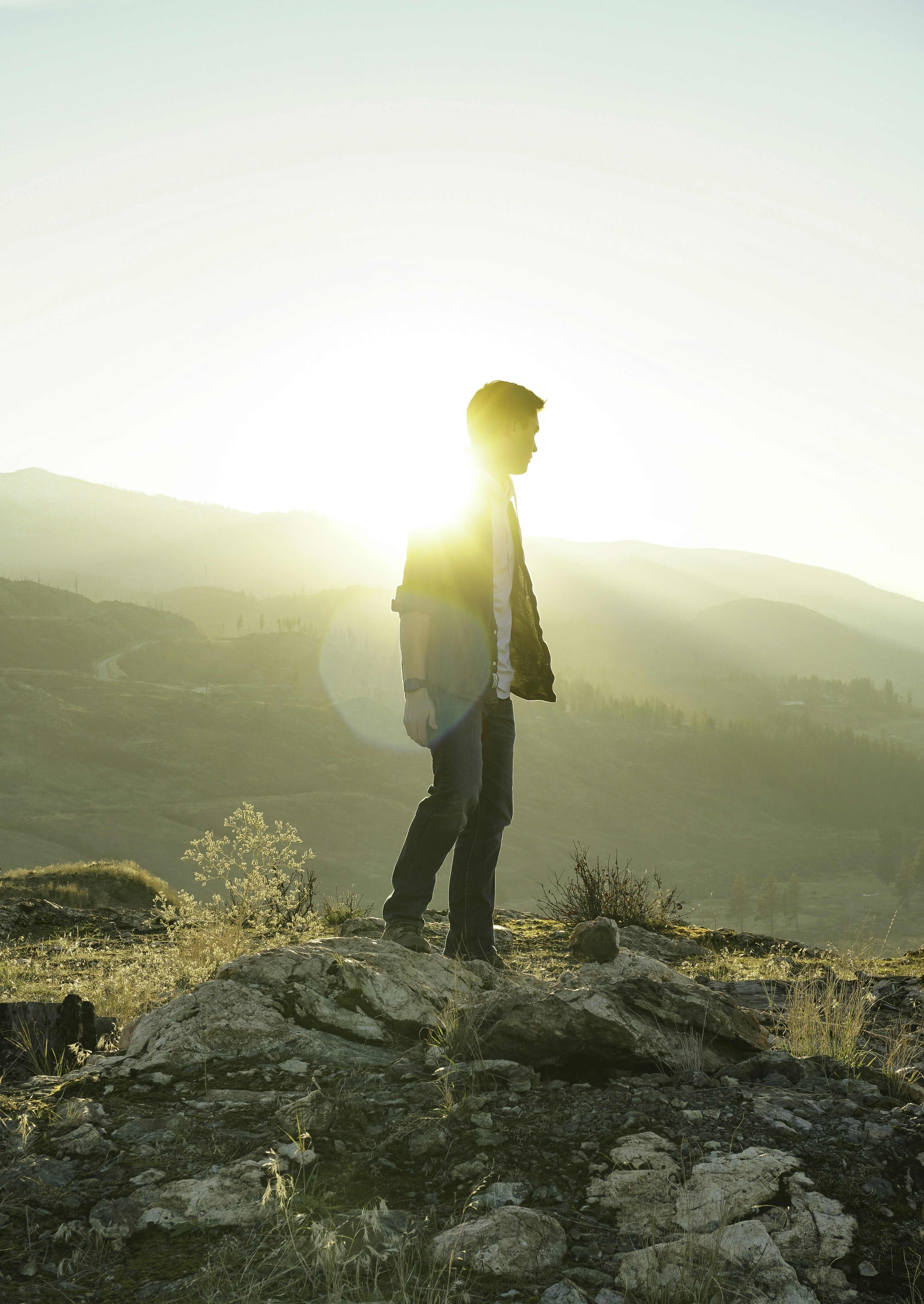 man standing on mountain