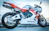 white and orange Honda sportbike