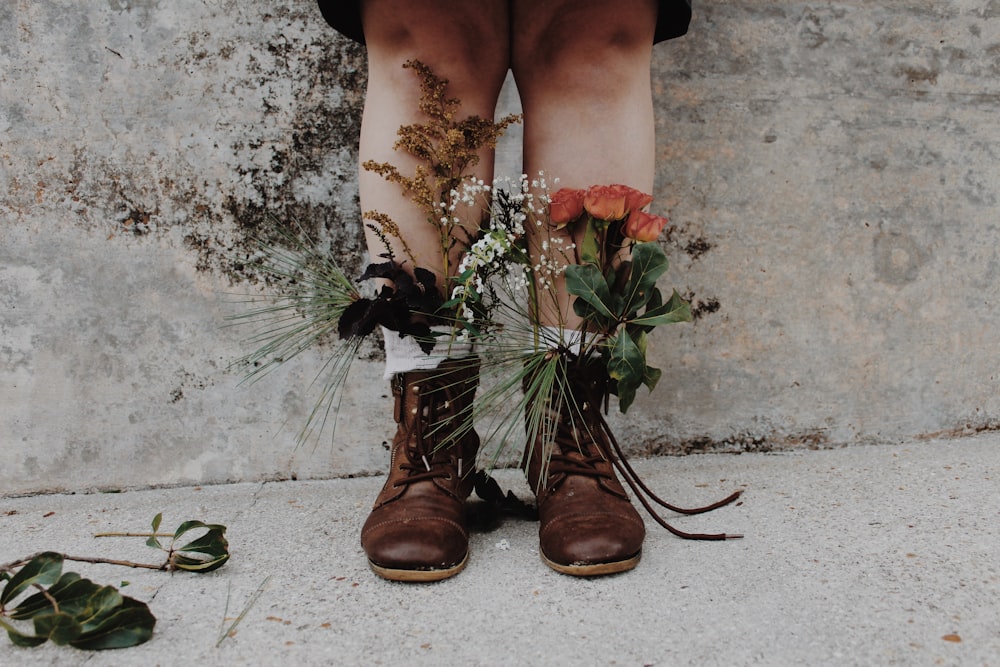 pair of brown leather boots