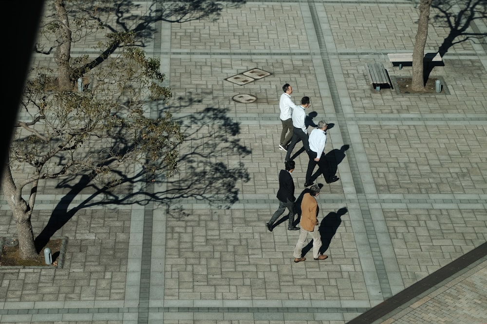 group of men walking at park