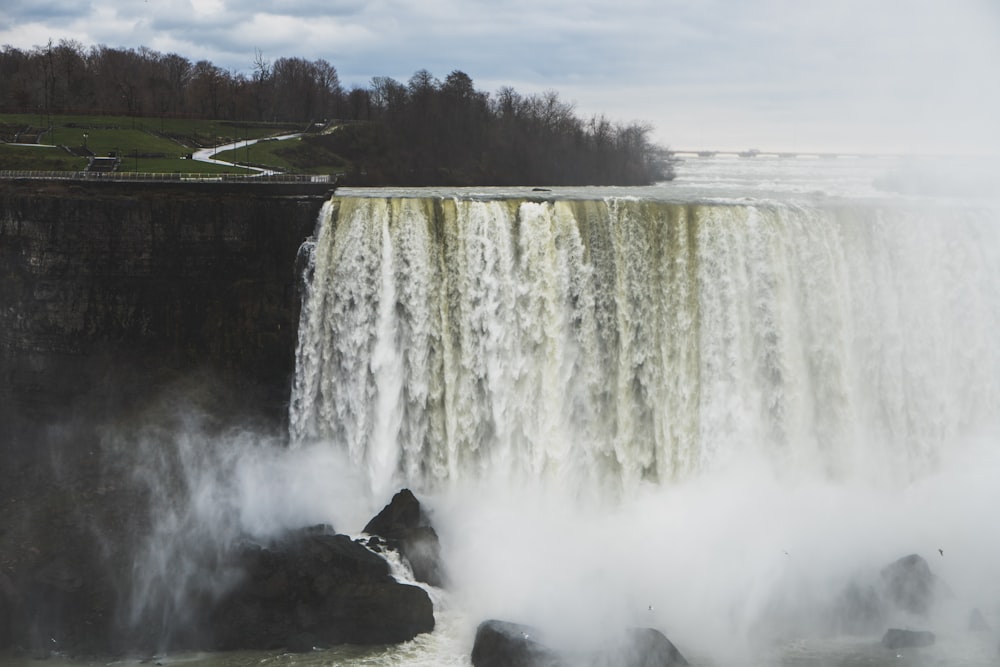 waterfall during daytime