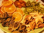 Bright and colorful image of sweet glazed banana chips arranged neatly on a plate.