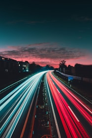 timelapse photography of vehicles at night