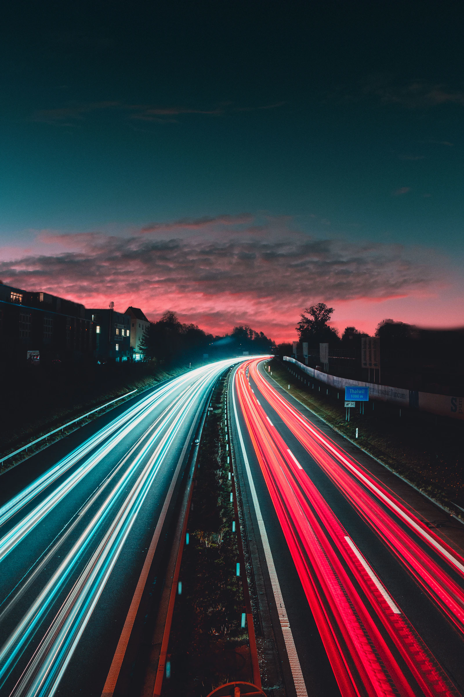 streaks of headlights on a highway at night