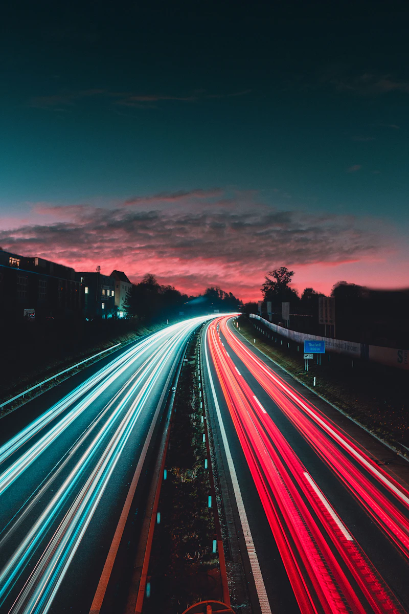 Streaks of headlights on a highway at night
