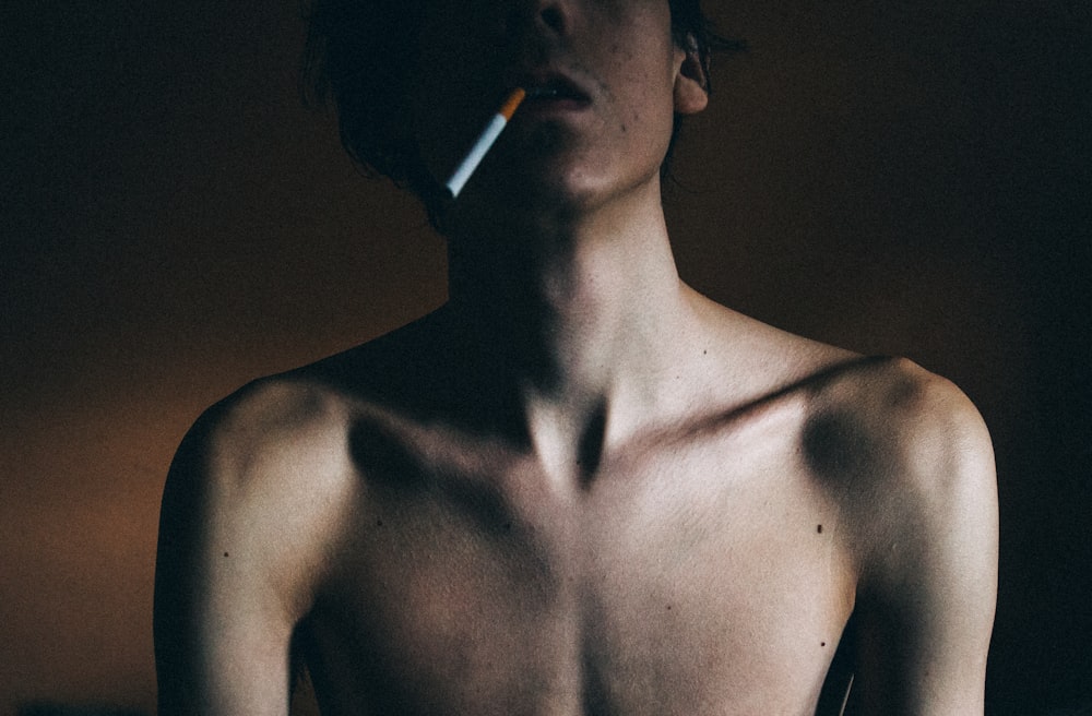 man with cigarette on mouth