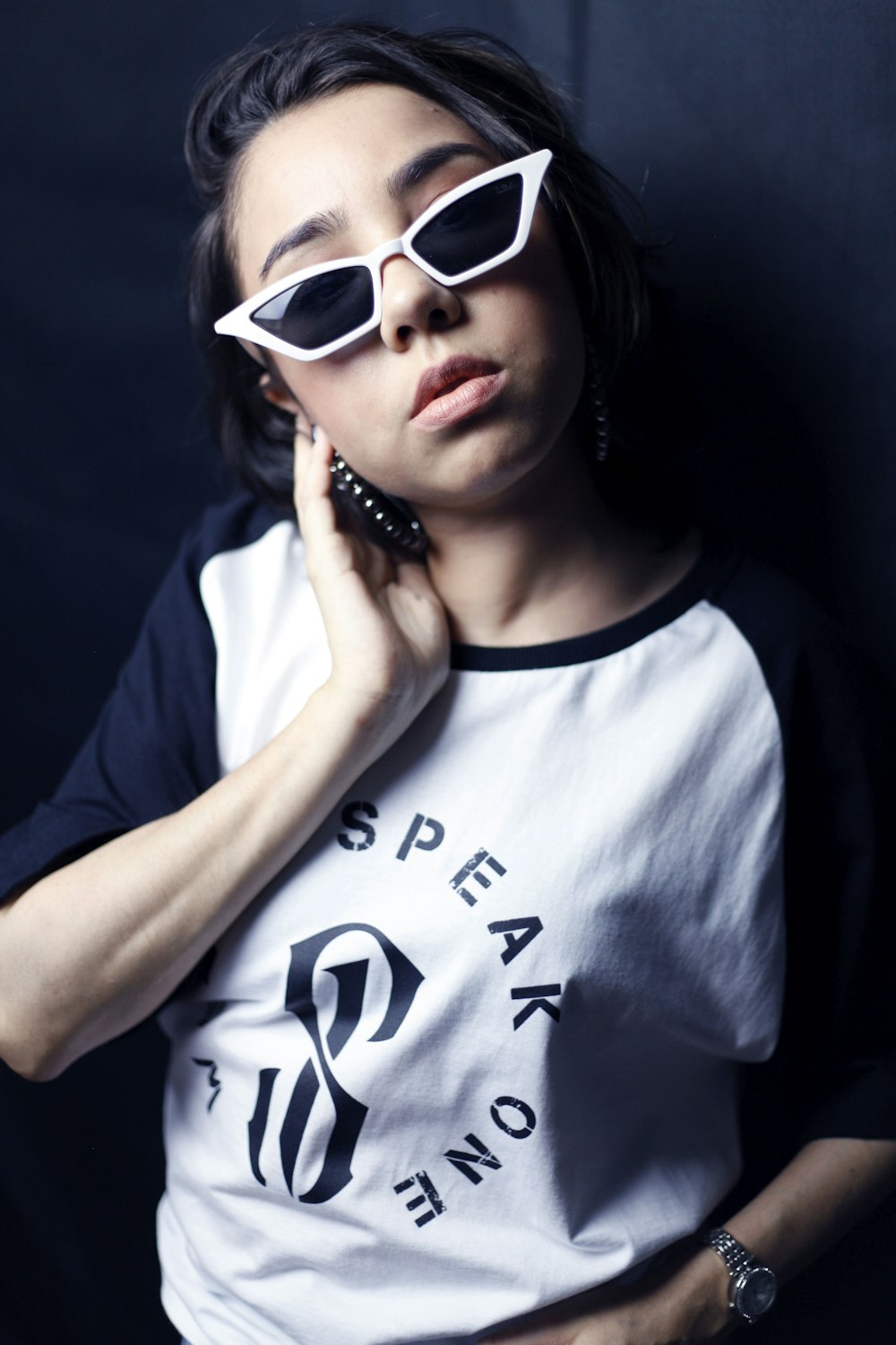 woman wearing white framed sunglasses