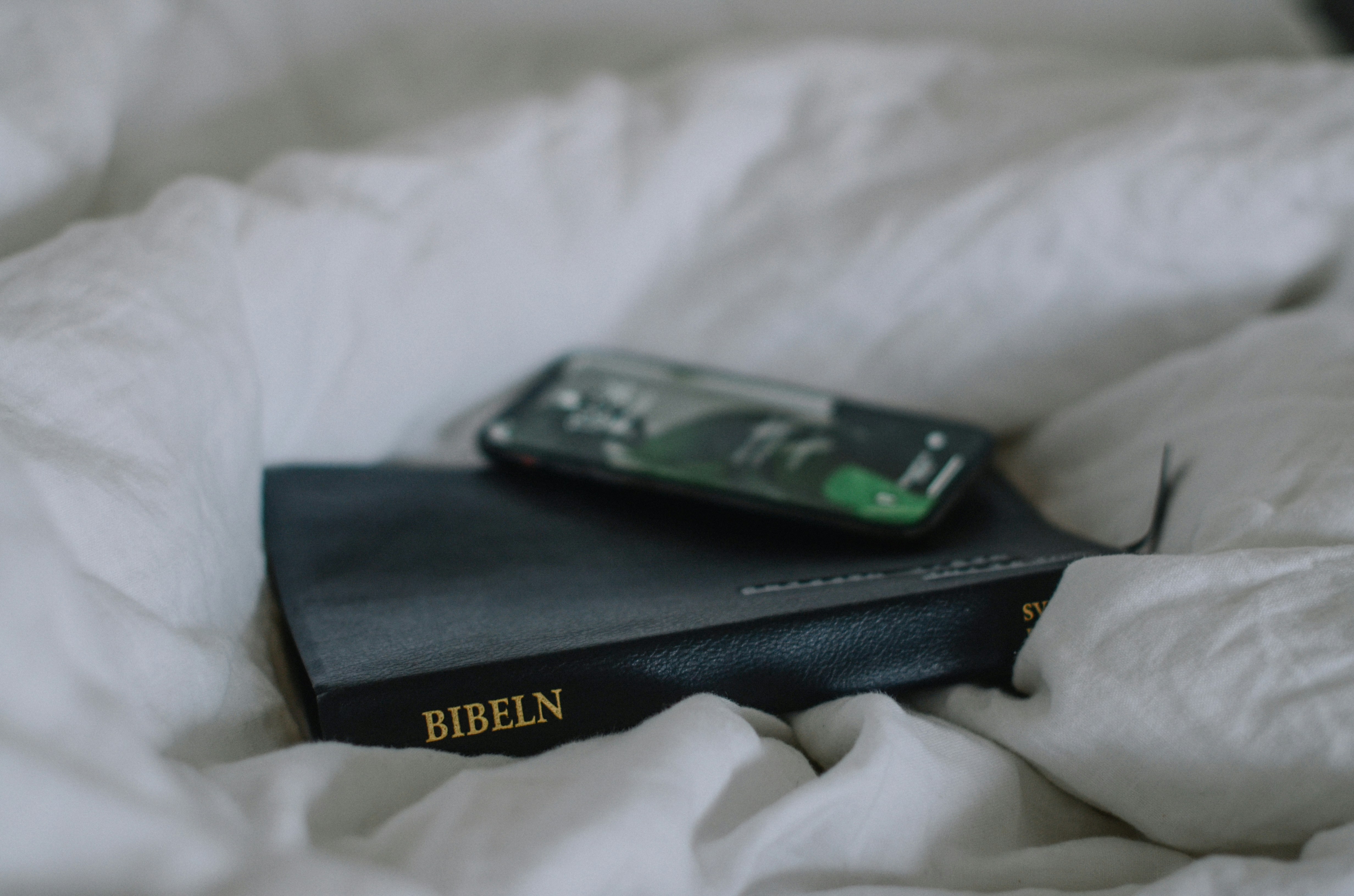 bible on white cloth