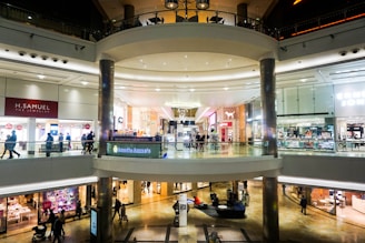 A vibrant shopping center showcasing various branded products.