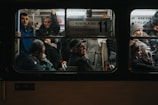 A diverse group of friends enjoying a bus journey together.
