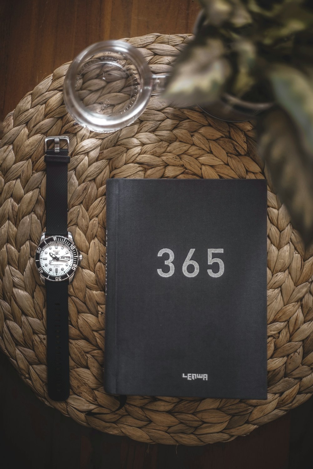 round black 365 analog watch with box