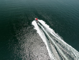 aerial photography of speedboat on body of water