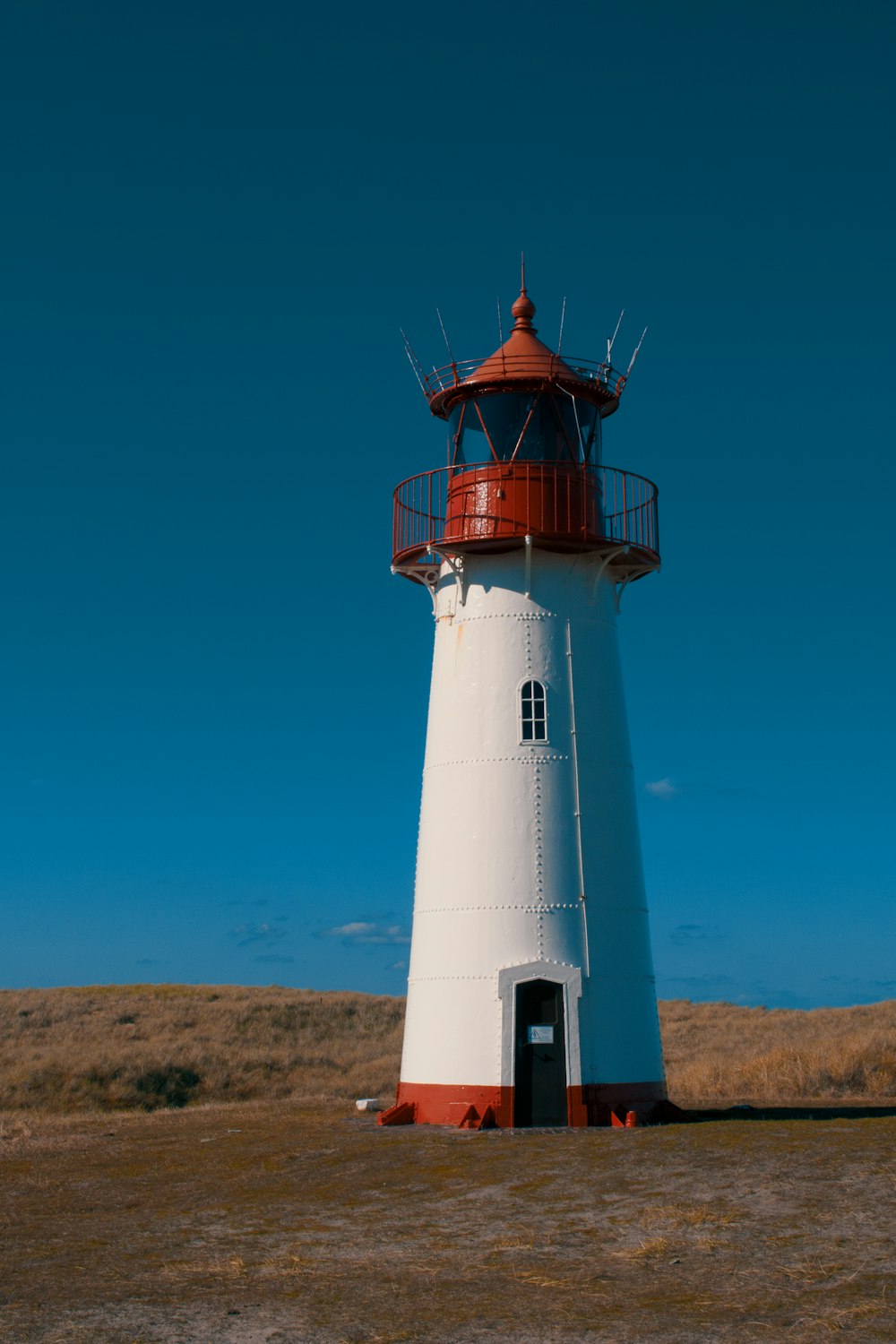 white and red lighthouse