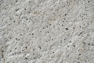Close-up of freshly poured concrete surface with smooth finish.