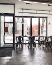 chairs beside tables inside restaurant