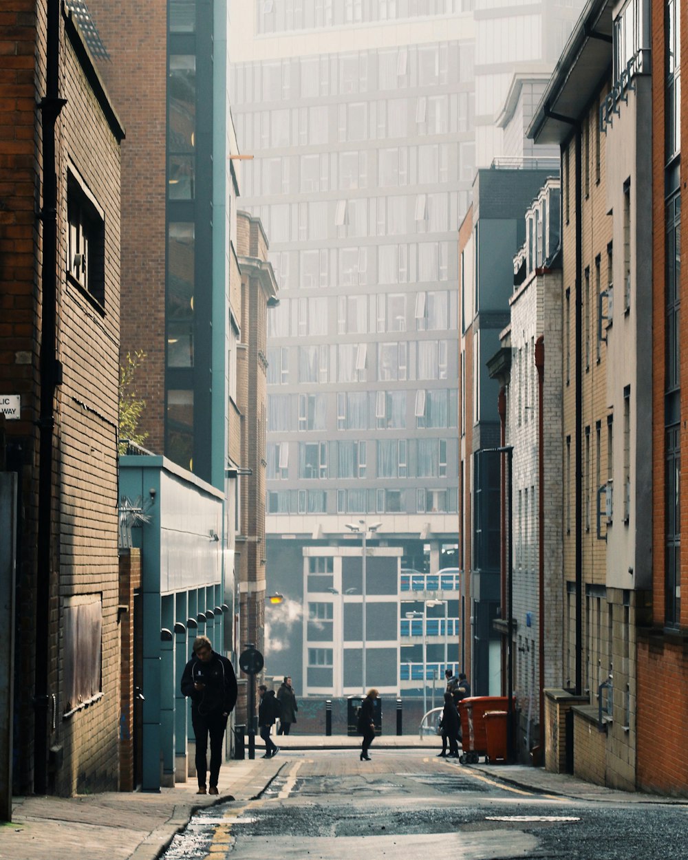 person walking along the alle