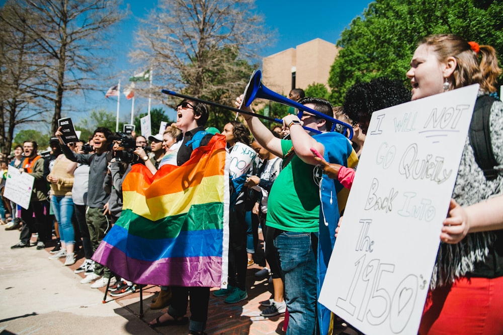 people making rally during daytime