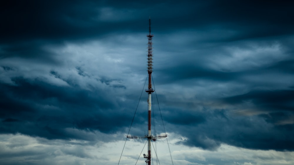 tower under cloudy sky at daytime
