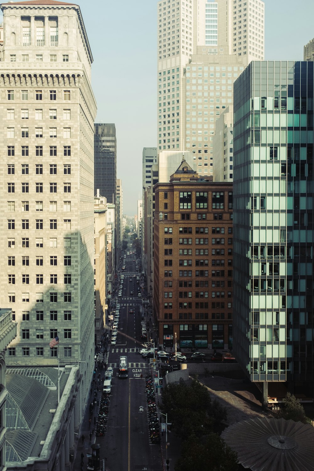 cars parked near buildings at daytime