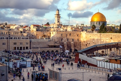 people gathered in front of concrete structures israel zoom background