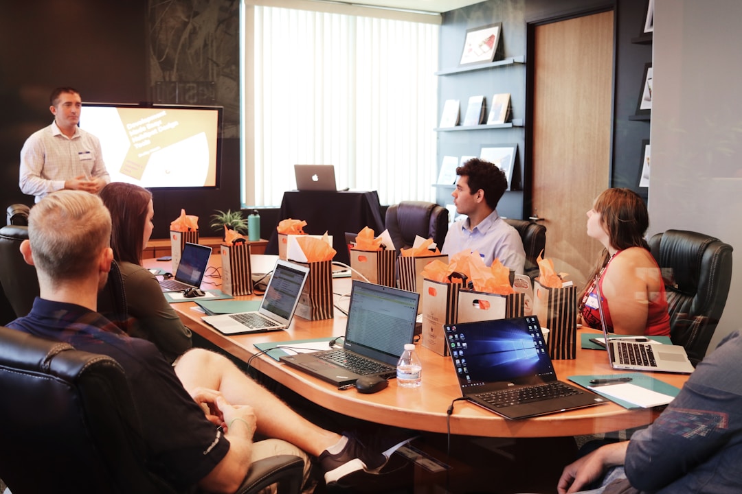 A team in an office discussing intelligent search during a meeting