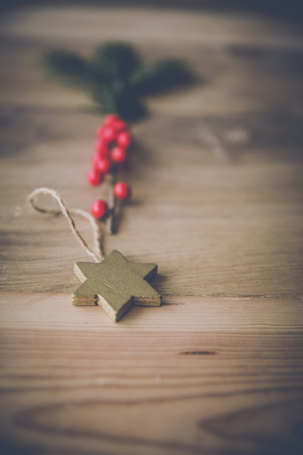 selective focus photography of star pendant