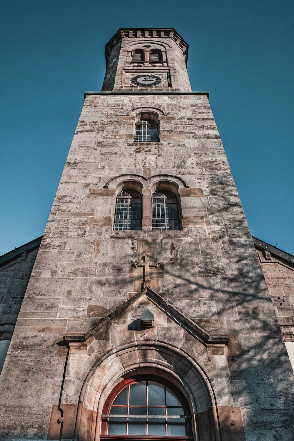 low-angle photography of brick cathedral