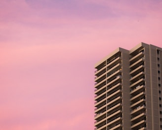 concrete building during sunset