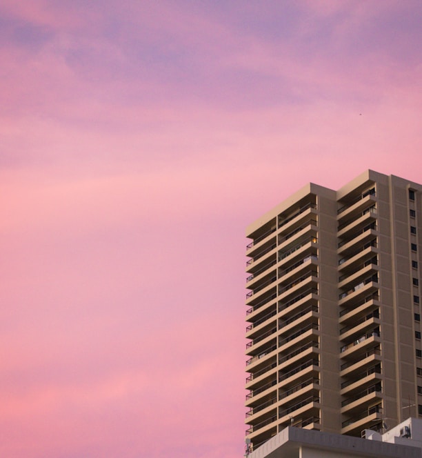 concrete building during sunset