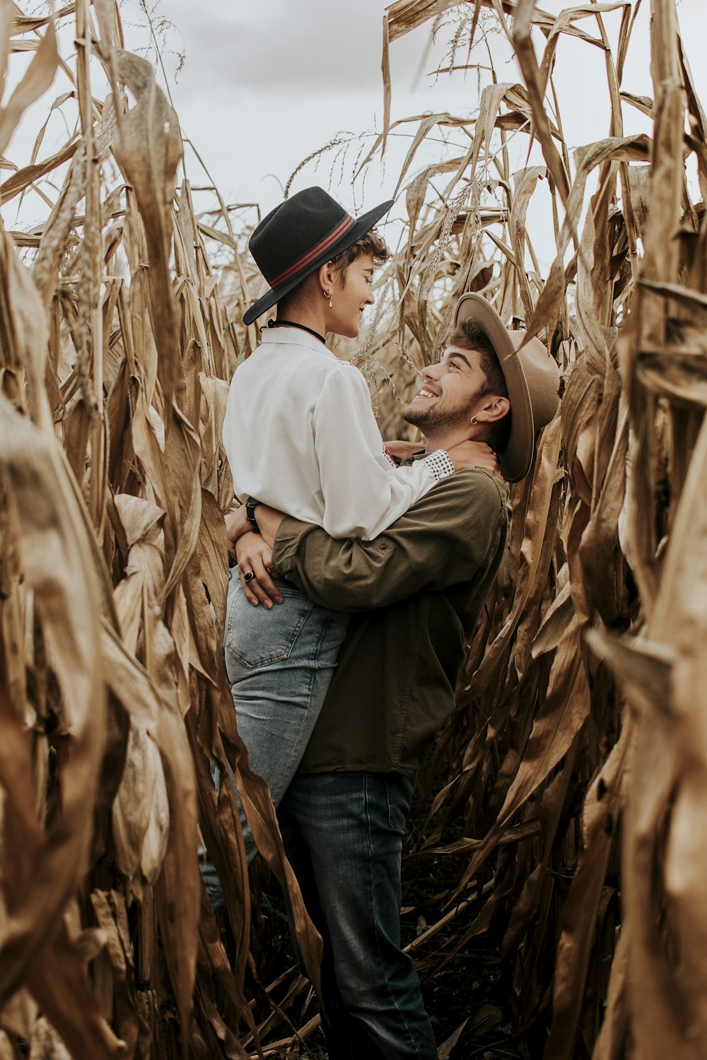 man hugging woman