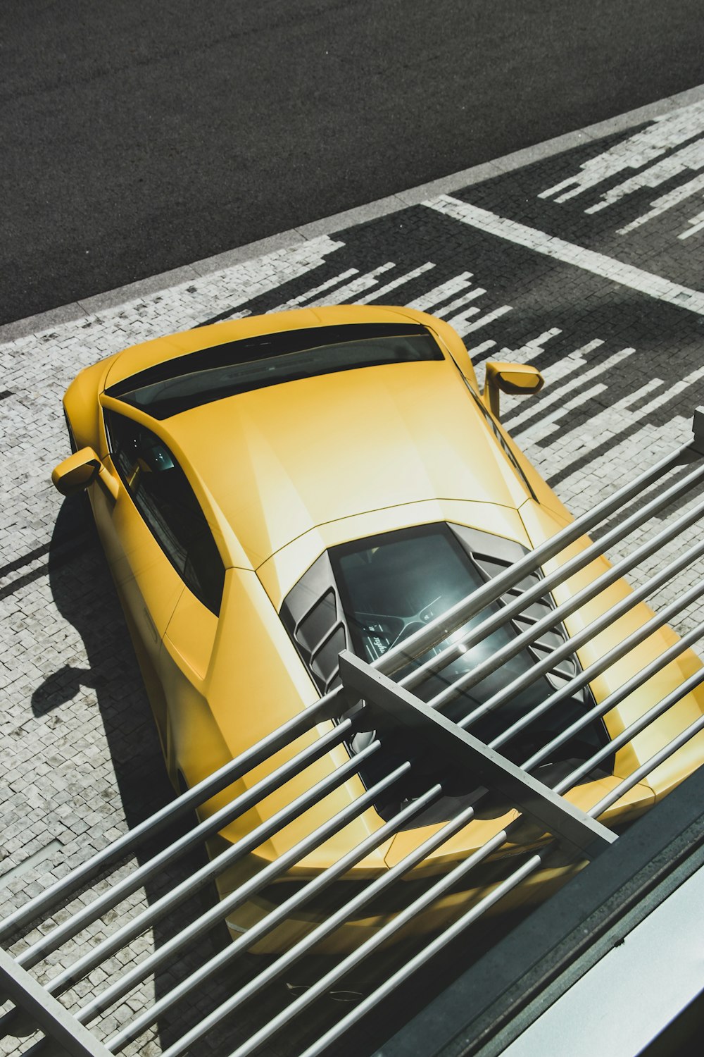 yellow and black Lamborghini coupe