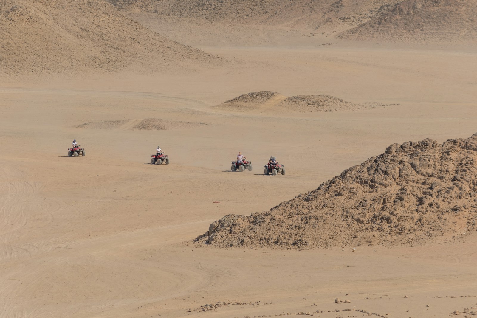 Canon EOS 7D Mark II + Canon EF-S 55-250mm F4-5.6 IS II sample photo. Four person riding on photography