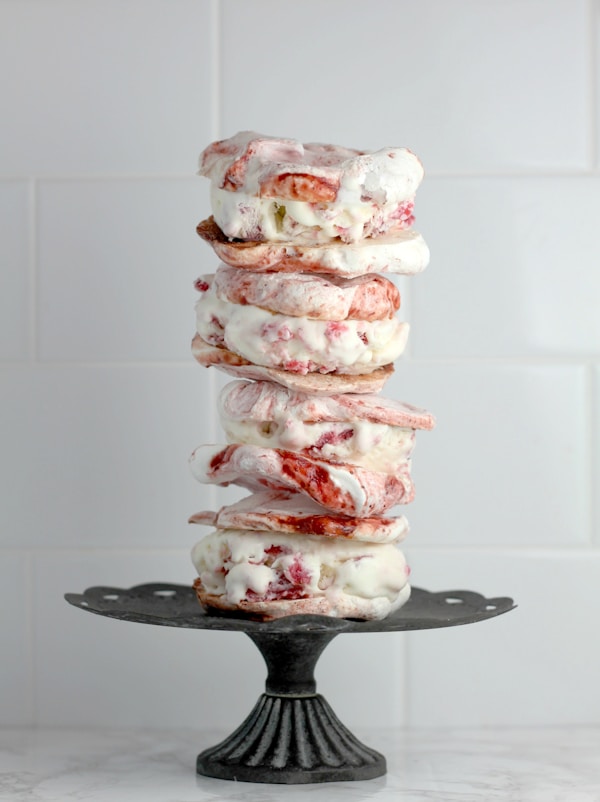 Pile of burger on cake stand