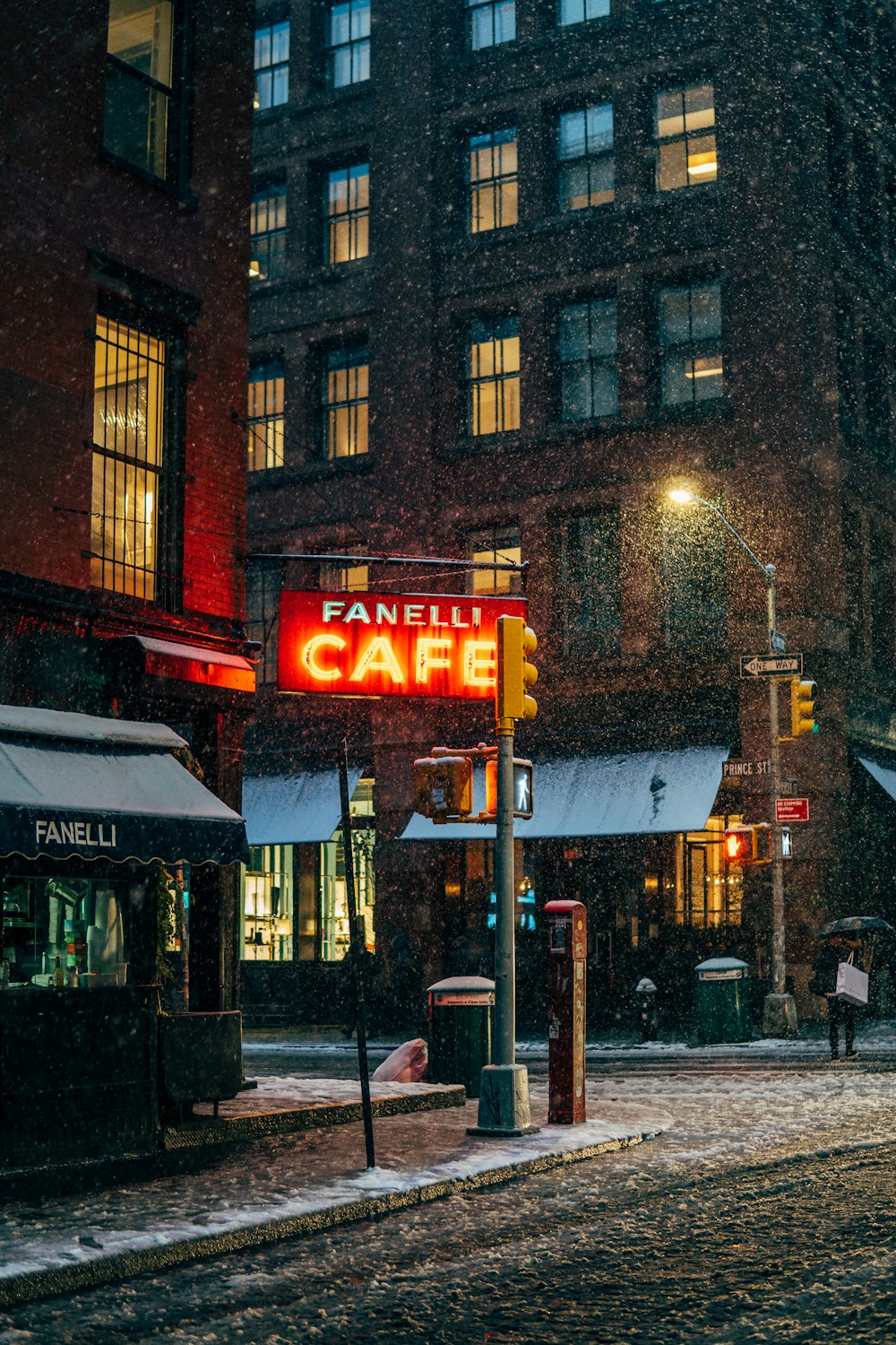 shallow focus photo of Fanelli Cafe lighted signage