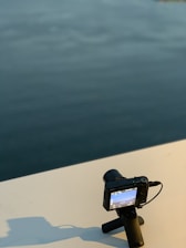 A serene water monitoring setup showcasing the Hydric app interface.