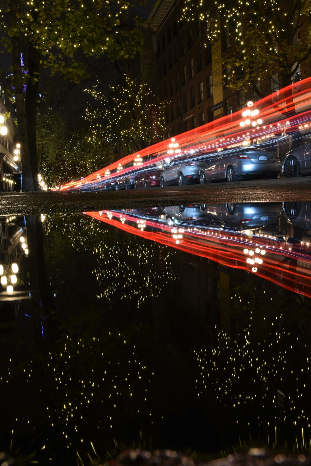 timelapse photography of vehicles on road at night