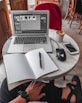 silver MacBook Air displaying Adobe file